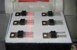 FIGURE 3. A laser line projection can be used to inspect leaded components to determine lead count, straightness and height of the leads, and whether any leads are missing. FIGURE 3. A laser line projection can be used to inspect leaded components to determine lead count, straightness and height of the leads, and whether any leads are missing.