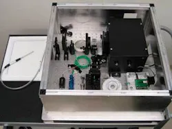 Using frequency-domain angle-resolved low-coherence interferometry, researchers from Duke University collect data from live tissue through an endoscopically-compatible fiber probe (left) designed to distinguish precancerous from normal tissue.