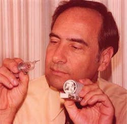 Theodore Maiman, with a ruby laser on the laser’s 25th anniversary.
