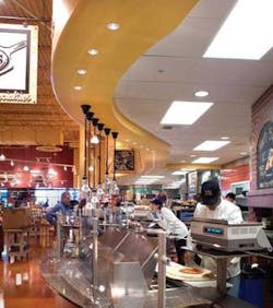 FIGURE 1. Metal-halide HID-based fiber-optic technology is being focused initially on the $2.5 billion MR-16 halogen market, currently the standard for commercial accent lighting. Recently developed technology produces equivalent levels of light while consuming 80% less power than the MR-16. Similar efficiency improvements can also be achieved compared to fluorescent lighting in freezer compartments due to the effects of cold temperatures on mercury. Current fiber-optic installation sites include supermarket chains (such as this Whole Foods Market in Colorado Springs, CO), retail stores, fast-food restaurants, theme parks and casinos, hotels, swimming pool, government structures, spas, and museums. FIGURE 1. Metal-halide HID-based fiber-optic technology is being focused initially on the $2.5 billion MR-16 halogen market, currently the standard for commercial accent lighting. Recently developed technology produces equivalent levels of light while consuming 80% less power than the MR-16. Similar efficiency improvements can also be achieved compared to fluorescent lighting in freezer compartments due to the effects of cold temperatures on mercury. Current fiber-optic installation sites include supermarket chains (such as this Whole Foods Market in Colorado Springs, CO), retail stores, fast-food restaurants, theme parks and casinos, hotels, swimming pool, government structures, spas, and museums.