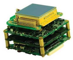 FIGURE 2. The Thermoteknix MIRICLE Alpha Silicon 384 × 288-resolution focal-plane-array detector has a three multilayer printed-circuit boards (PCB) that enable shutterless operation. The first PCB is directly connected to the detector and handles generation of timing signals required by the detector and digitization of the analog signals from the detector. The middle card is the processing engine of the camera and contains the algorithms used to extract a noise-free image from the raw detector image and also contains the XTi technology that removes the need for a mechanical shutter. The third PCB handles power-supply management and interfaces to external systems. FIGURE 2. The Thermoteknix MIRICLE Alpha Silicon 384 × 288-resolution focal-plane-array detector has a three multilayer printed-circuit boards (PCB) that enable shutterless operation. The first PCB is directly connected to the detector and handles generation of timing signals required by the detector and digitization of the analog signals from the detector. The middle card is the processing engine of the camera and contains the algorithms used to extract a noise-free image from the raw detector image and also contains the XTi technology that removes the need for a mechanical shutter. The third PCB handles power-supply management and interfaces to external systems.