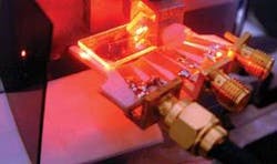 A guided-wave acousto-optic light modulator is the central design element of the Mark III holo-video display. A guided-wave acousto-optic light modulator is the central design element of the Mark III holo-video display.