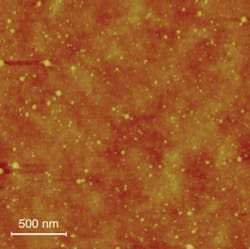 FIGURE 4. Because nanoparticles are formed during the laser-ablation process itself, the particles can be collected by any substrate material at room temperature. An atomic-force-microscopy (AFM) image shows nanoparticles uniformly dispersed on a transparent polymer substrate. FIGURE 4. Because nanoparticles are formed during the laser-ablation process itself, the particles can be collected by any substrate material at room temperature. An atomic-force-microscopy (AFM) image shows nanoparticles uniformly dispersed on a transparent polymer substrate.