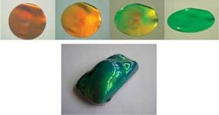 The color of polymer opals changes depending on the size of the nanospheres used in their lattice structure and the amount of infused carbon nanoparticles. A range of decorative and photonic applications could be imagined for either flexible films (top) or molded opals, such as this miniature automobile (bottom).