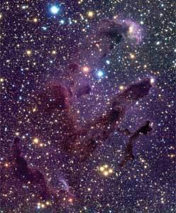 FIGURE 3. This composite of three images was taken using J, H, and K filters with Teledyne’s HAWAII-1 short-wave IR detector array (1 to 2.5 µm) in the ISAAC instrument of the Very Large Telescope (VLT) in Chile. The pillars in the infrared view of the Eagle Nebula are less prominent than in visible-light images because near-IR light penetrates the thinner parts of the gas and dust clouds. FIGURE 3. This composite of three images was taken using J, H, and K filters with Teledyne’s HAWAII-1 short-wave IR detector array (1 to 2.5 µm) in the ISAAC instrument of the Very Large Telescope (VLT) in Chile. The pillars in the infrared view of the Eagle Nebula are less prominent than in visible-light images because near-IR light penetrates the thinner parts of the gas and dust clouds.