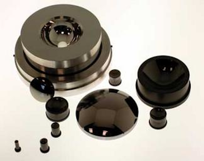 MOLDED OPTICS Molded glass aspheric optics hit the target for