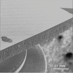 FIGURE 2. Fiber lasers are enabling new applications, including the machining of silicon wafers with negligible edge cracking compared to conventional laser processes. FIGURE 2. Fiber lasers are enabling new applications, including the machining of silicon wafers with negligible edge cracking compared to conventional laser processes.