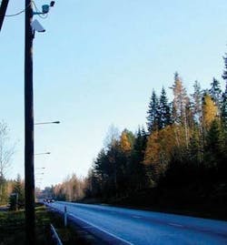 The DCS111 laser system installed on a pole monitors a roadway near Kouvola, Utti, Finland. The DCS111 laser system installed on a pole monitors a roadway near Kouvola, Utti, Finland.