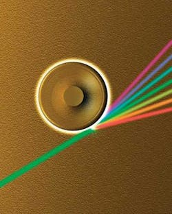 FIGURE 2. In a rendering of the microtoroid, the green pump laser light is converted into a frequency comb (colored light beams on the right side) within the microtoroid. FIGURE 2. In a rendering of the microtoroid, the green pump laser light is converted into a frequency comb (colored light beams on the right side) within the microtoroid.