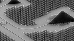 FIGURE 2. Silicon monolithic-chip manufacturing promises to make 40 Gbit/s optical active cables affordable for up to 300 m transmission. Direct mounting of optical fibers to the top of the chip enables flip-chip-mounted lasers. FIGURE 2. Silicon monolithic-chip manufacturing promises to make 40 Gbit/s optical active cables affordable for up to 300 m transmission. Direct mounting of optical fibers to the top of the chip enables flip-chip-mounted lasers.