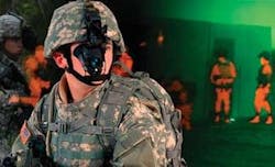 FIGURE 3. An Enhanced Night Vision Goggle (ENVG) system and optically fused imagery at the background show the green image from an image intensifier combined with the amber infrared image.