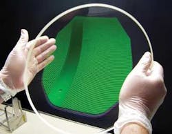 FIGURE 1. A head-up display combiner with a rugate coating is used in aircraft to reflect a monochromatic green display. FIGURE 1. A head-up display combiner with a rugate coating is used in aircraft to reflect a monochromatic green display.