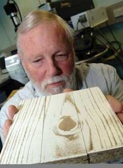 Lasers are used to imprint a wood-grain design onto the surface of medium-density fiberboard, giving it the appearance of expensive wood. Lasers are used to imprint a wood-grain design onto the surface of medium-density fiberboard, giving it the appearance of expensive wood.