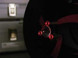 FIGURE 1. A 19 mm molded glass aspheric lens is tested using a Zygo XP/D interferometer. FIGURE 1. A 19 mm molded glass aspheric lens is tested using a Zygo XP/D interferometer.