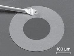 A scanning-electron micrograph of the actual device. A scanning-electron micrograph of the actual device.