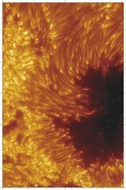 The close-up of a sunspot in active region 10030 on July 15, 2002, is the highest resolution solar image ever achieved. The darkest part of the image is the umbra, where magnetic upwelling from within the Sun is absent. In the penumbra (just outside the umbra), bright filaments reveal dark cores. In comparison, Earth is roughly the size of the umbra of this sunspot. The close-up of a sunspot in active region 10030 on July 15, 2002, is the highest resolution solar image ever achieved. The darkest part of the image is the umbra, where magnetic upwelling from within the Sun is absent. In the penumbra (just outside the umbra), bright filaments reveal dark cores. In comparison, Earth is roughly the size of the umbra of this sunspot.