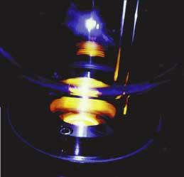 Stimulated Raman scattering results in bands of light shifted by multiples of a characteristic wavelength. This wavelength is produced by a vibrational transition in the host material. Although relatively simple to demonstrate, a complete explanation of this effect requires quantum electrodynamic theory.