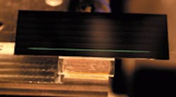FIGURE 1. A silicon optical bench can contain an erbium-doped planar optical waveguide amplifier. FIGURE 1. A silicon optical bench can contain an erbium-doped planar optical waveguide amplifier.