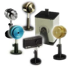 FIGURE 1: Various instruments used in beam profiling include different slit scanners pictured here (the cylindrical instruments). The narrow width of the silicon-based camera system in the foreground allows it to fit into narrow spaces along the optical path. A goniometric radiometer with a test fixture for optical fiber measurements is in the back. FIGURE 1: Various instruments used in beam profiling include different slit scanners pictured here (the cylindrical instruments). The narrow width of the silicon-based camera system in the foreground allows it to fit into narrow spaces along the optical path. A goniometric radiometer with a test fixture for optical fiber measurements is in the back.