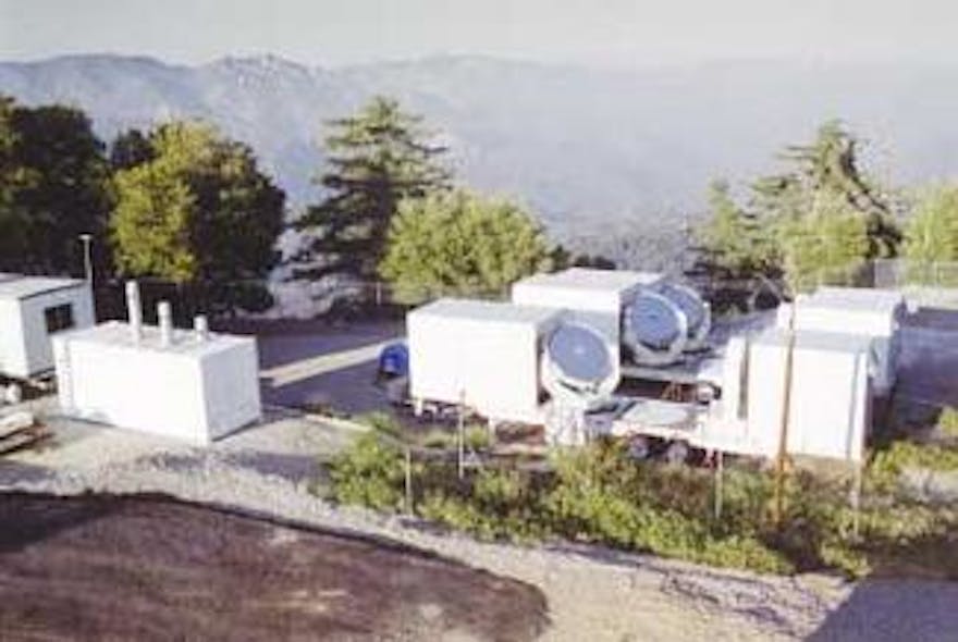 FIGURE 1. The ISI&apos;s three telescopes are on a 4m/8m/12m east-west baseline. The square building at left houses the master laser, which is split and sent to each telescope via the periscopes emerging from the top of the building. The telescope lasers are phase-locked onto this master laser beam, which is then returned along the same path for pathlength compensation. The master-laser building houses pathlength-compensation detection, electronics, and servo-control systems.