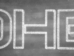 FIGURE 2. The glass modules are marked with clearly visible alphanumeric characters by a diode-pumped solid-state laser emitting at either 355 or 266 nm, depending on the type of glass. FIGURE 2. The glass modules are marked with clearly visible alphanumeric characters by a diode-pumped solid-state laser emitting at either 355 or 266 nm, depending on the type of glass.