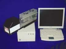 FIGURE 3. A marking system based on a compact CO2 laser is small and simple enough that it can become a standard personal-computer accessory. FIGURE 3. A marking system based on a compact CO2 laser is small and simple enough that it can become a standard personal-computer accessory.