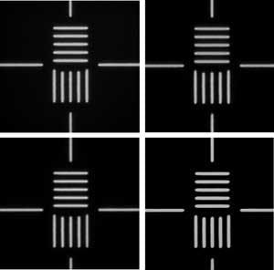 FIGURE 3. Images taken using the first prototype objective and varifocal optics are of 0.5-&micro;m-wide line and spaces at 266, 313, 365, and 436 nm.