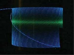 FIGURE 3. David Payne of the University of Southampton will present a paper on a helical fiber laser that can be created through upconversion fluorescence from a fiber laser with a large-diameter helical core. The helical geometry enables the use of large cores that are still single mode, since higher-order modes are radiated away similar to mode filtering via fiber bend loss. FIGURE 3. David Payne of the University of Southampton will present a paper on a helical fiber laser that can be created through upconversion fluorescence from a fiber laser with a large-diameter helical core. The helical geometry enables the use of large cores that are still single mode, since higher-order modes are radiated away similar to mode filtering via fiber bend loss.