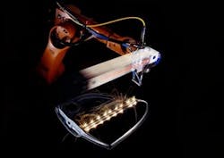 FIGURE 2. The thin-disk-laser beam quality of 8 mm mrad (independent from the output power level) has proven to be the key factor in the development of new remote-laser welding applications. Remote-laser welding allows the welding of car body and other metal parts by using a two-axis scanner that is placed about 50 cm above the weld joint. The robot coarsely positions the scanner, while the scanner can position the laser beam accurately within its scanning field at very high positioning speeds. FIGURE 2. The thin-disk-laser beam quality of 8 mm mrad (independent from the output power level) has proven to be the key factor in the development of new remote-laser welding applications. Remote-laser welding allows the welding of car body and other metal parts by using a two-axis scanner that is placed about 50 cm above the weld joint. The robot coarsely positions the scanner, while the scanner can position the laser beam accurately within its scanning field at very high positioning speeds.