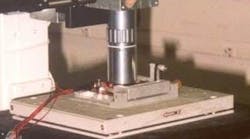 A nanopositioning stage is in use by the National Institute of Health’s Computer Integrated Systems for Microscopy and Manipulation center at the University of North Carolina (Chapel Hill, NC) to perform nanometer-resolution long-range tracking during magnetic-force experiments on biological samples. Here, a magnetics stage is mounted on a nanopositioning stage in an inverted optical microscope. A nanopositioning stage is in use by the National Institute of Health’s Computer Integrated Systems for Microscopy and Manipulation center at the University of North Carolina (Chapel Hill, NC) to perform nanometer-resolution long-range tracking during magnetic-force experiments on biological samples. Here, a magnetics stage is mounted on a nanopositioning stage in an inverted optical microscope.