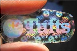 FIGURE 1. A paper in the BiOS Symposium at Photonics West shows how the biocompatible nature of silk allows seamless embedding of active optics in everyday objects. The readout is provided by the optical element, for example, as a color or image change; when something unwanted is present (such as E. coli bacteria), the color changes or the holographic images disappear. FIGURE 1. A paper in the BiOS Symposium at Photonics West shows how the biocompatible nature of silk allows seamless embedding of active optics in everyday objects. The readout is provided by the optical element, for example, as a color or image change; when something unwanted is present (such as E. coli bacteria), the color changes or the holographic images disappear.