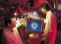 Engineers at TRW have developed an EUV laser for the Engineering Test Stand based on expertise in solid-state lasers and flowing xenon-jet technology that they must now direct toward scaling to meet the demands of a commercial system. Engineers at TRW have developed an EUV laser for the Engineering Test Stand based on expertise in solid-state lasers and flowing xenon-jet technology that they must now direct toward scaling to meet the demands of a commercial system.