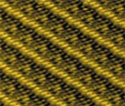 Liquid-crystal molecules align on a sheet of graphite in a scanning tunneling microscope image. Experiments show that the molecules can crystallize even above the usual 'melting' temperature if they are placed in a narrow space between two surfaces. Liquid-crystal molecules align on a sheet of graphite in a scanning tunneling microscope image. Experiments show that the molecules can crystallize even above the usual 'melting' temperature if they are placed in a narrow space between two surfaces.