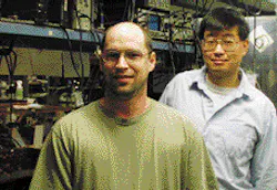 A new and flexible approach to the synthesis of coherent light has been demonstrated by researchers Robert Shelton (left) and Jun Ye, shown here in the laboratory.