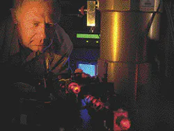 Russian astronomy technology has been adapted to test chips like the Pentium and PowerPC. University of Rochester's Roman Sobolewski, co-creator of the detector, is shown here testing the device with a laser.