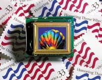 FIGURE 3. The eMagin SVGA+ OLED microdisplay is smaller than a postage stamp, measuring 0.62 in. diagonally. FIGURE 3. The eMagin SVGA+ OLED microdisplay is smaller than a postage stamp, measuring 0.62 in. diagonally.