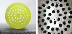 A silver halide preform for an octagonal photonic-crystal fiber has an outer diameter of 16 mm (left). A photonic-crystal fiber extruded from the preform has an outer diameter of 900 µm (right, central portion of fiber is shown).