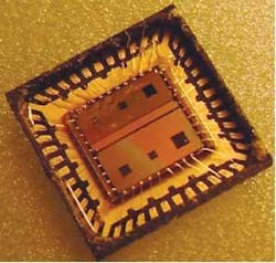 FIGURE 4. The final integrated circuits are contained in an open-cavity package, here viewed from the top. FIGURE 4. The final integrated circuits are contained in an open-cavity package, here viewed from the top.