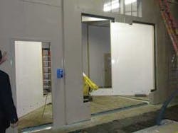 FIGURE 2. United States and international laser-safety regulations for “walk-in” workstations require that emission of laser radiation equivalent to Class 3B or Class 4 must be prevented by engineering means, while someone is present inside the enclosure. FIGURE 2. United States and international laser-safety regulations for “walk-in” workstations require that emission of laser radiation equivalent to Class 3B or Class 4 must be prevented by engineering means, while someone is present inside the enclosure.