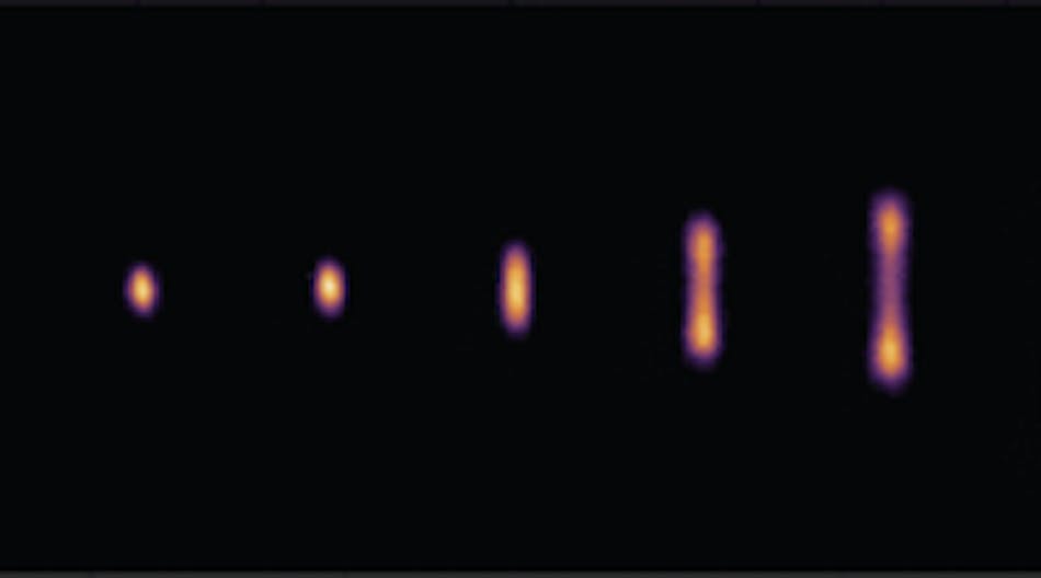 Ion-luminescence images of an atom show the transition from random to coherent motion.