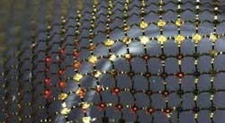 A stretchable ILED display consists of an interconnected mesh of printed micro-ILEDs bonded to a rubber substrate. A stretchable ILED display consists of an interconnected mesh of printed micro-ILEDs bonded to a rubber substrate.