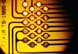 FIGURE 1. The flexible printed circuit is one kind of microelectronics packaging that benefits from laser micromachining; others are ball grid arrays, multichip modules, and micro vias.