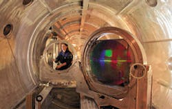 Click here to enlarge image Laser physicist Deanna Pennington adjusts a diagnostic lens inside Lawrence Livermore National Laboratory’s petawatt laser. The ultrashort-pulse, quadrillion-watt laser is the most powerful laser in the world. Click here to enlarge image Laser physicist Deanna Pennington adjusts a diagnostic lens inside Lawrence Livermore National Laboratory’s petawatt laser. The ultrashort-pulse, quadrillion-watt laser is the most powerful laser in the world.