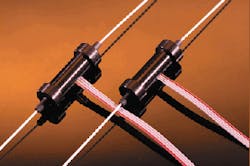 FIGURE 1. Fiberoptic variable attenuator based on a side-polished fiber architecture can be electronically controlled with no moving parts. Insertion loss and backreflection are near-zero. FIGURE 1. Fiberoptic variable attenuator based on a side-polished fiber architecture can be electronically controlled with no moving parts. Insertion loss and backreflection are near-zero.