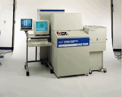FIGURE 1. Laser trim system provides high-throughput trimming of precision semiconductor integrated passive components. FIGURE 1. Laser trim system provides high-throughput trimming of precision semiconductor integrated passive components.