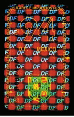 Hologram used as a registration sticker in Mexico City has a custom amber coating that makes the hologram hard to duplicate; a 'high-tack' security adhesive makes it impossible to remove intact from the windshield. Hologram used as a registration sticker in Mexico City has a custom amber coating that makes the hologram hard to duplicate; a 'high-tack' security adhesive makes it impossible to remove intact from the windshield.