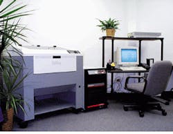 A PolyScience chiller provides up to 2500 W of heat-removal capacity to the Epilog Radius Laser Engineering and Cutting system. The chiller is shown installed to the right of the Epilog system, which continuously produces prototypes and production pieces. A PolyScience chiller provides up to 2500 W of heat-removal capacity to the Epilog Radius Laser Engineering and Cutting system. The chiller is shown installed to the right of the Epilog system, which continuously produces prototypes and production pieces.