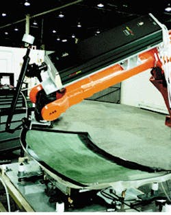 Robot-guided sealed carbon dioxide laser trims excess plastic laminate from the edges of an automobile windshield. Robot-guided sealed carbon dioxide laser trims excess plastic laminate from the edges of an automobile windshield.