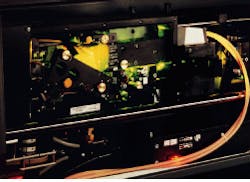 Output-coupling scheme in which dye laser beam is 'picked off' from the broadband spectrum reduces amplified spontaneous emission significantly compared to early dye-laser designs. Output-coupling scheme in which dye laser beam is 'picked off' from the broadband spectrum reduces amplified spontaneous emission significantly compared to early dye-laser designs.