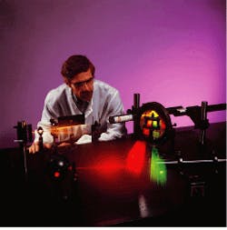 Peter Emmel demonstrates operation of diffractive phase plates for spot-array generation. Peter Emmel demonstrates operation of diffractive phase plates for spot-array generation.